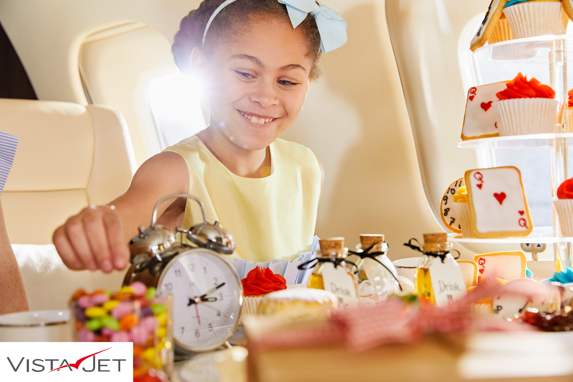 Child eating party food on a plane