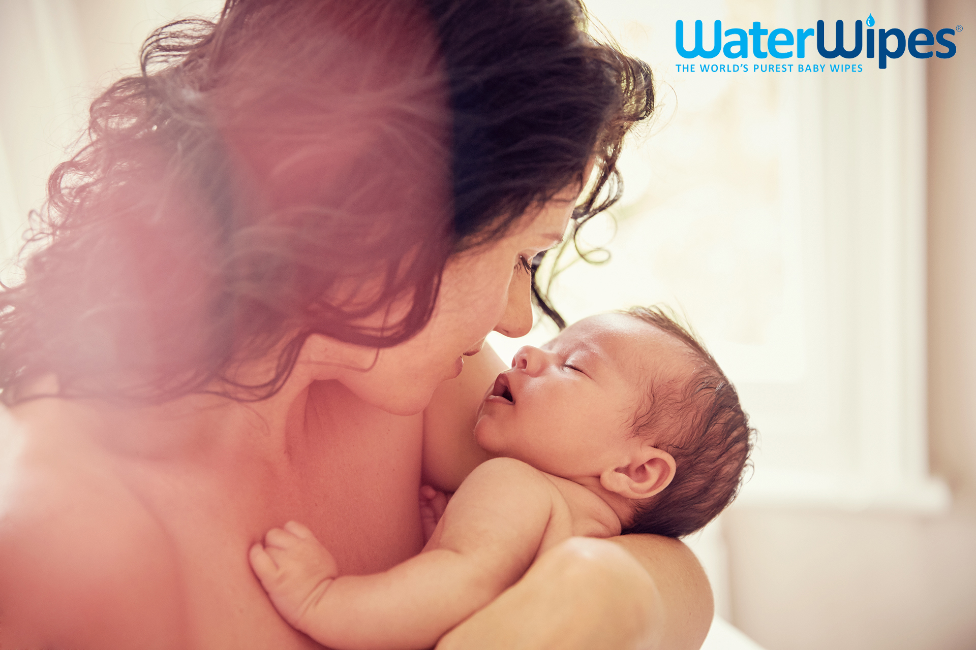WaterWipes mother holding newborn Emma Tunbridge