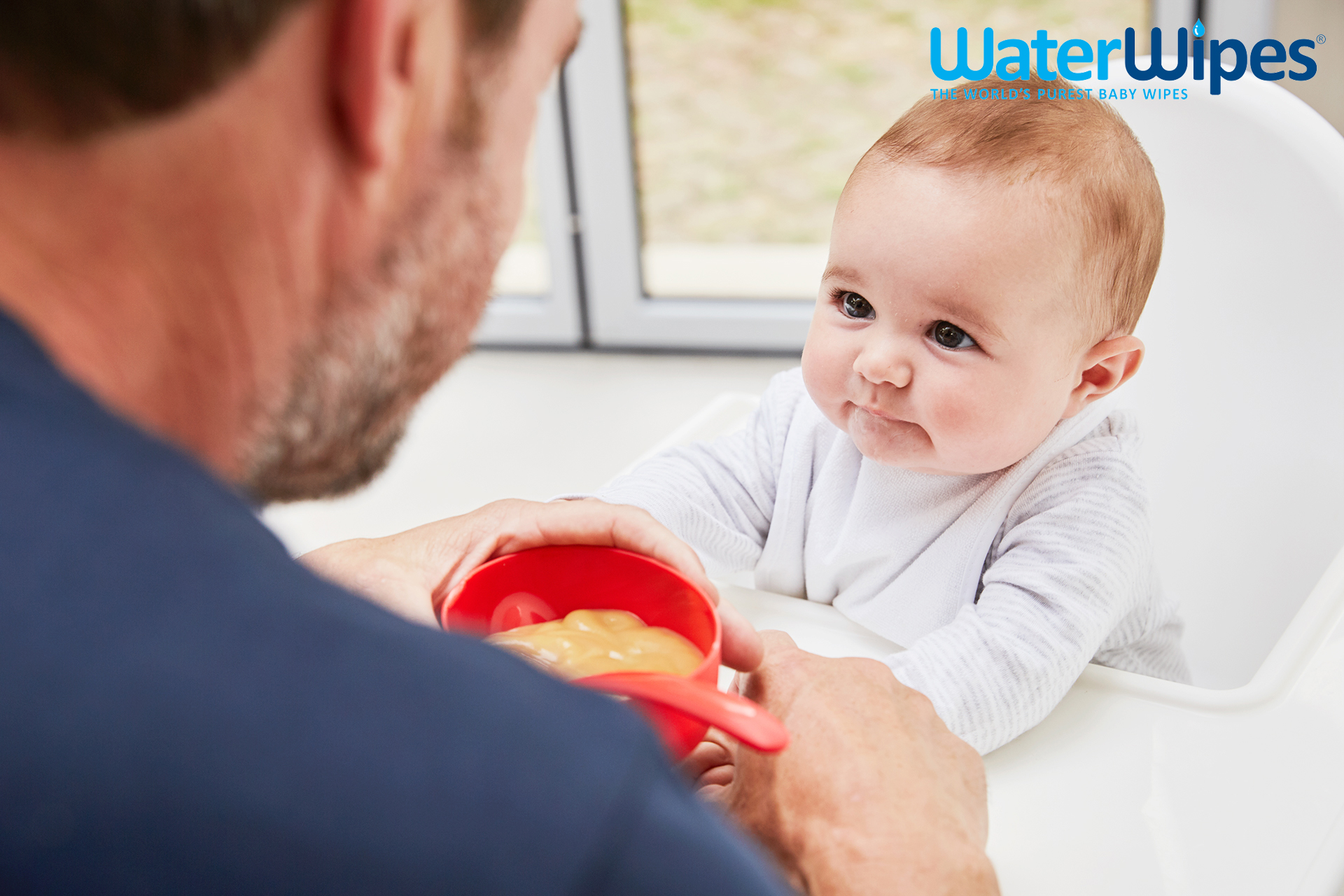 WaterWipes daddy feeding baby Emma Tunbridge